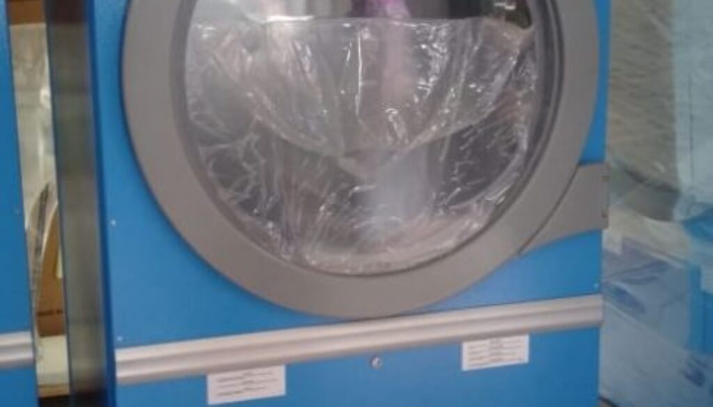 mesin laundry hotel